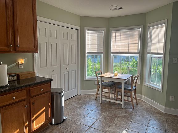 Dining table with folding leaf. Seats 4.