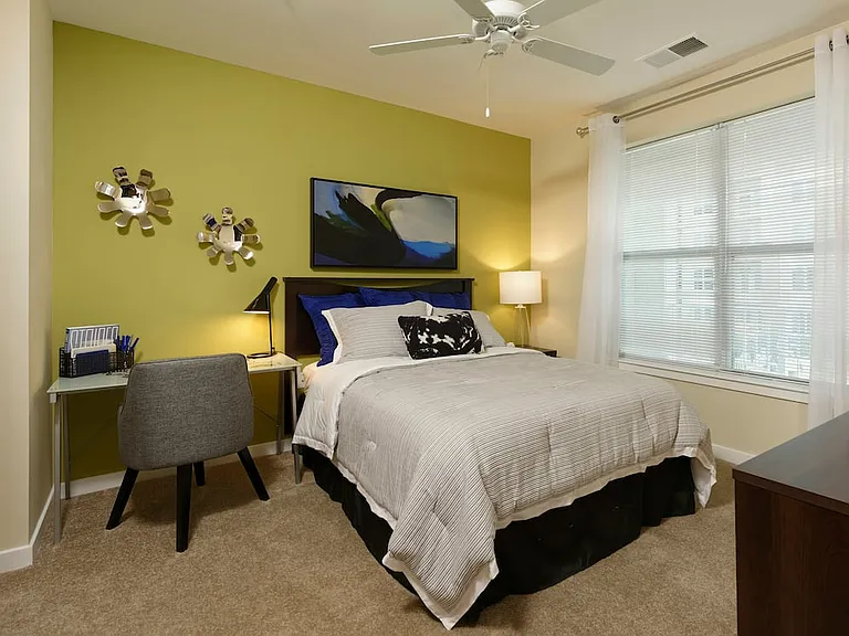 Hunt Valley - Finish Package I and II Carpeted bedroom with ceiling fan