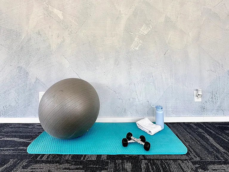 Unwind and energize in our 24-hour fitness center's dedicated yoga studio, offering a tranquil space for yoga practice.