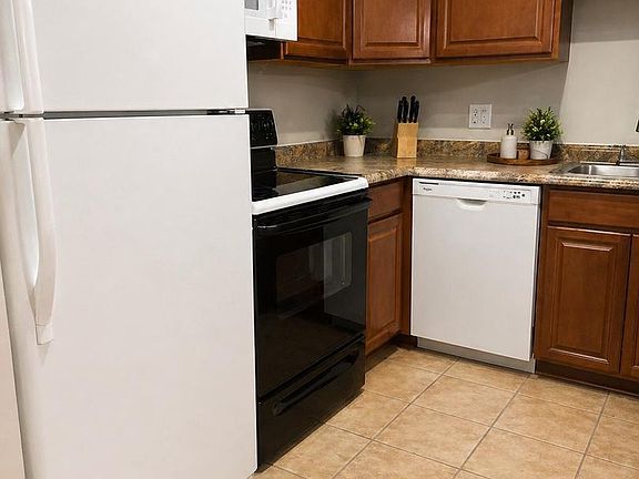 4th image of 10107 Prince Pl Unit 103-9B