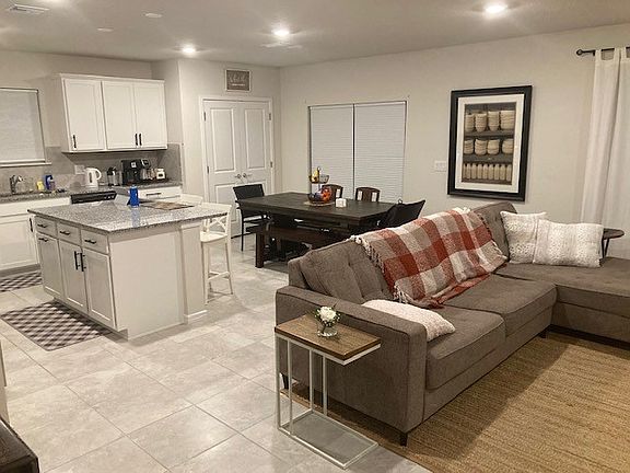 Living space, dining space, kitchen. Furniture not included, but all major appliances included.