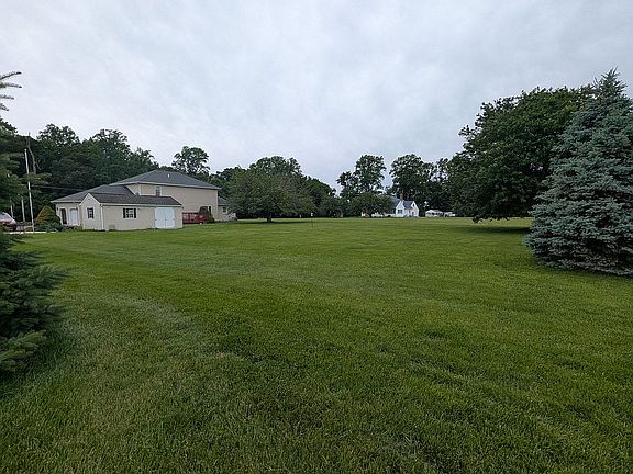 Large yard w/ mature trees
