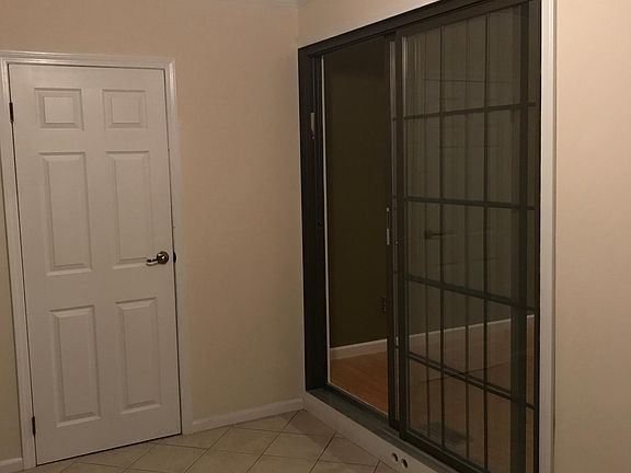 Sunroom off the living room overlooking the deck