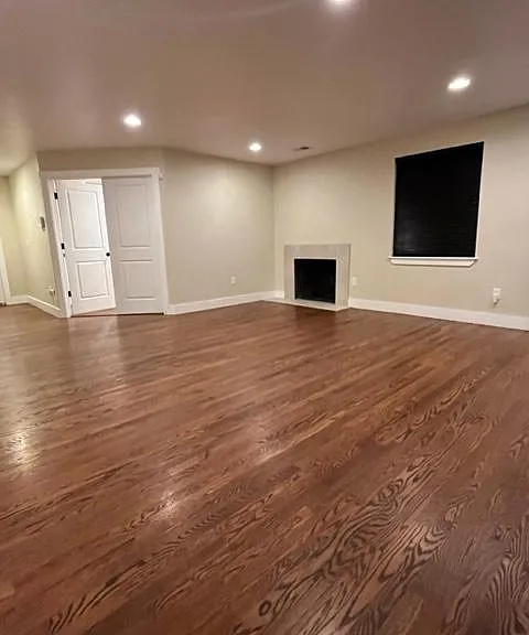 View from the dinning room towards the front of the house facing the fireplace and den