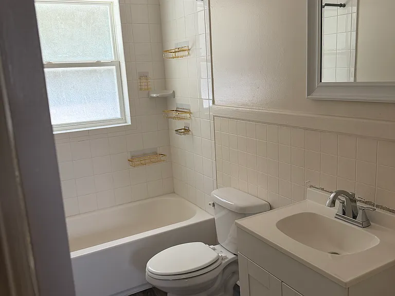 Tub and Shower combo, Toilet and Vanity
