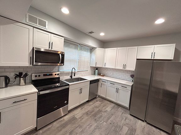 All new appliances: fridge & freezer, stove & oven , microwave and dishwasher