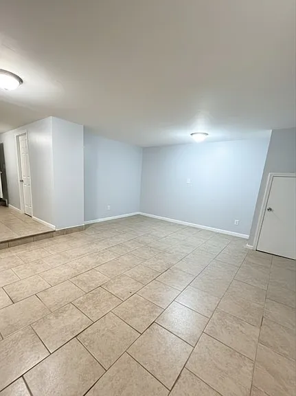 12009 Farmers Blvd #1 — Photo 1