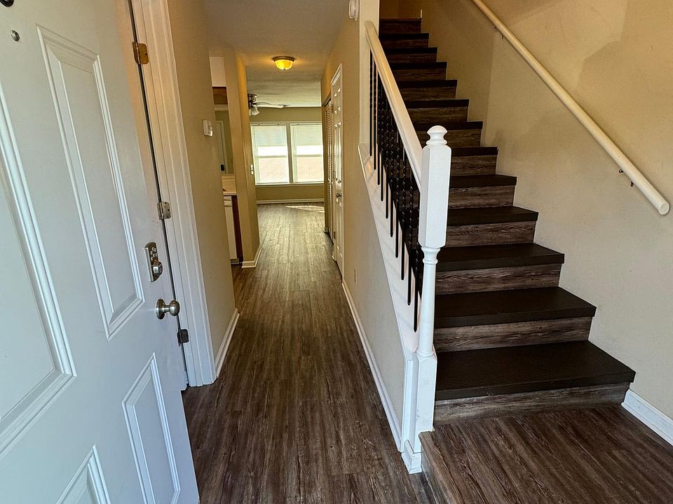 From the front door looking down hallway and up the stairs