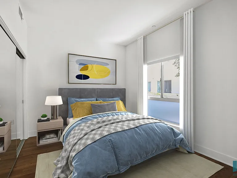 Bedroom with Large-Size Windows, Mirrored Closet, and Vinyl Flooring
