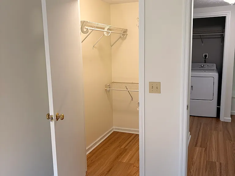 west bedroom with walk in closet