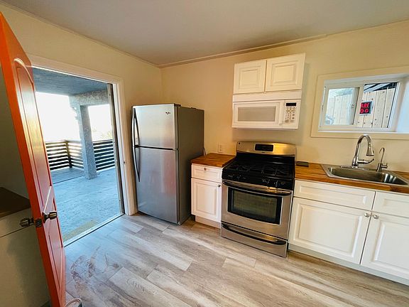 Kitchen with stainless steel appliances