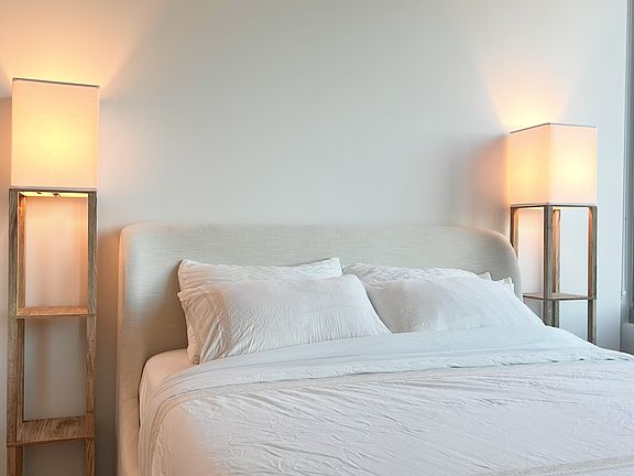 Queen-sized memory foam mattress with West Elm queen bed frame