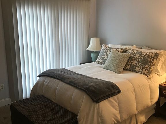 Bedroom with slider to deck and 2 closets.