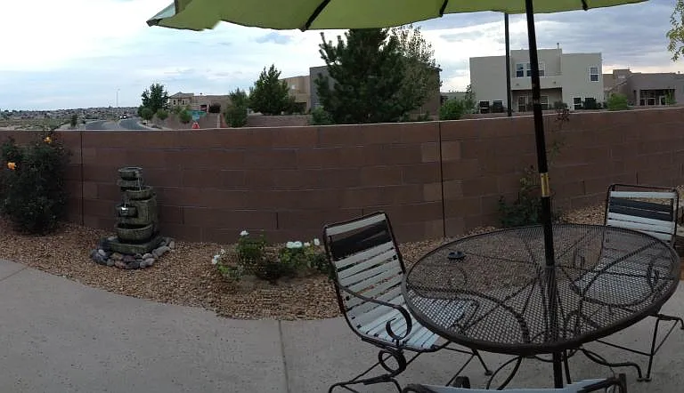 panoramic view of the spacious backyard