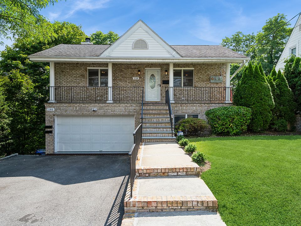 138 Woodside Avenue.
Carefully maintained front lawn. Driveway parking.