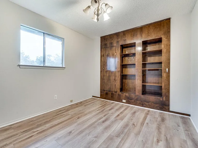 Built ins.... Ceiling fans throughout home all NEW HARD FLOORING!