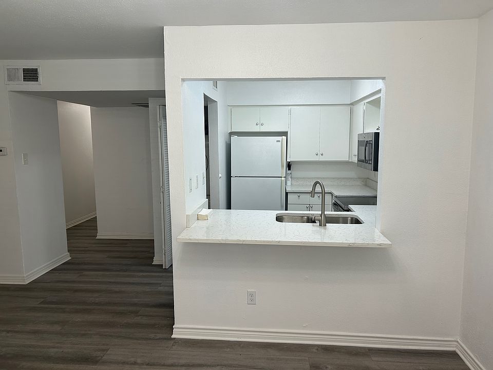 Fully equipped kitchen open to the living room. Refrigerator is included in the rent.
