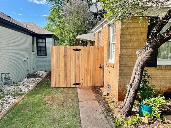 New fence gate, entry to the backyard