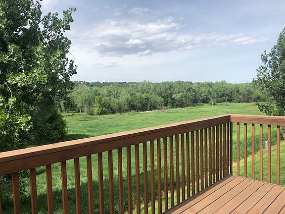 Private balcony overlooking the expansive greenspace
