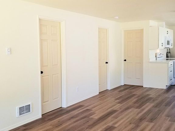 Fresh paint and new LVT flooring. New range, microwave and refrigerator with ice maker.