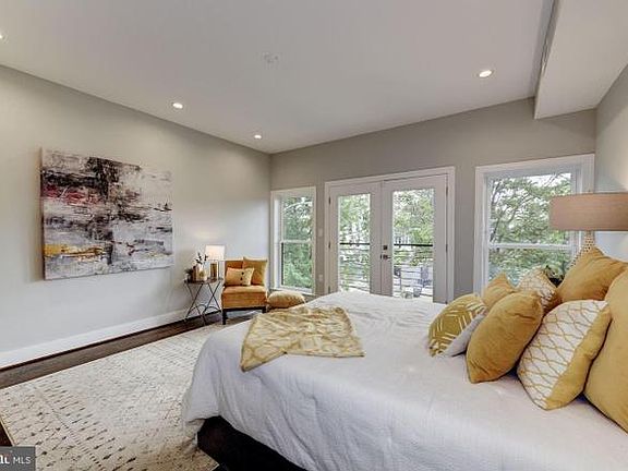 Primary Bedroom overlooking community garden