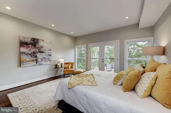Primary Bedroom overlooking community garden