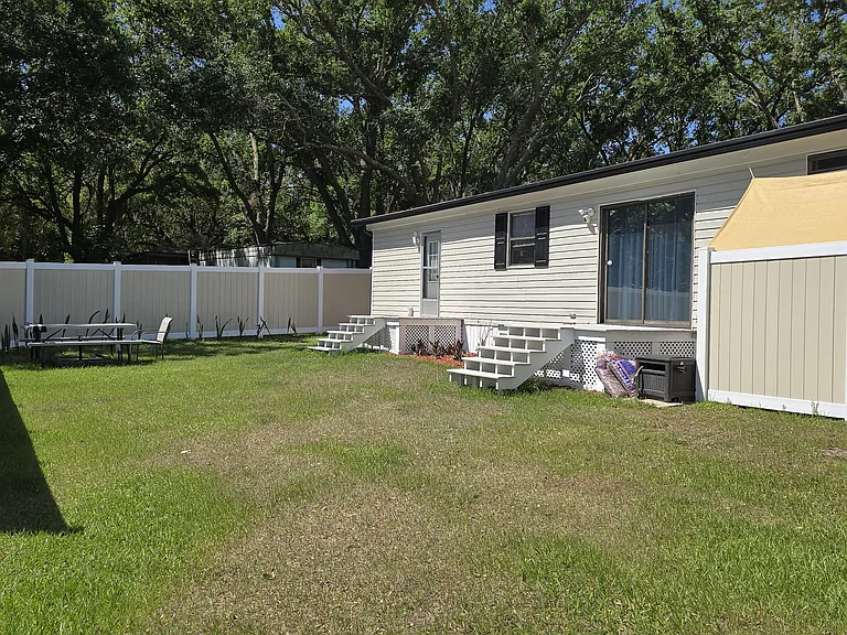Backyard
"Fully fenced backyard _ ideal for pets, entertaining, or relaxing."