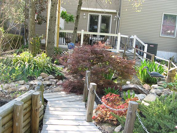 Bridge to pond and waterfall