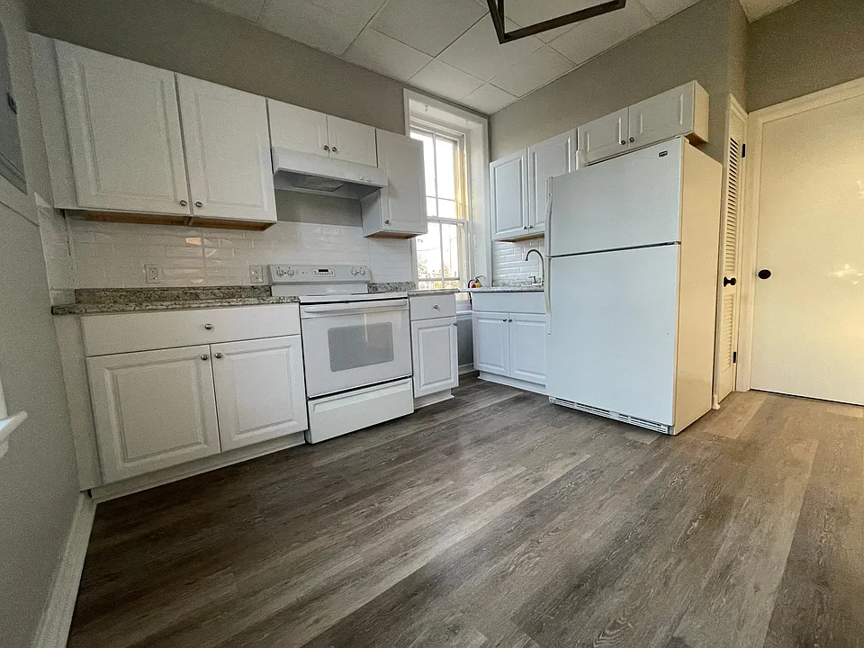 Kitchen with a pantry.