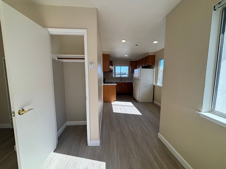 Living room closet and kitchen