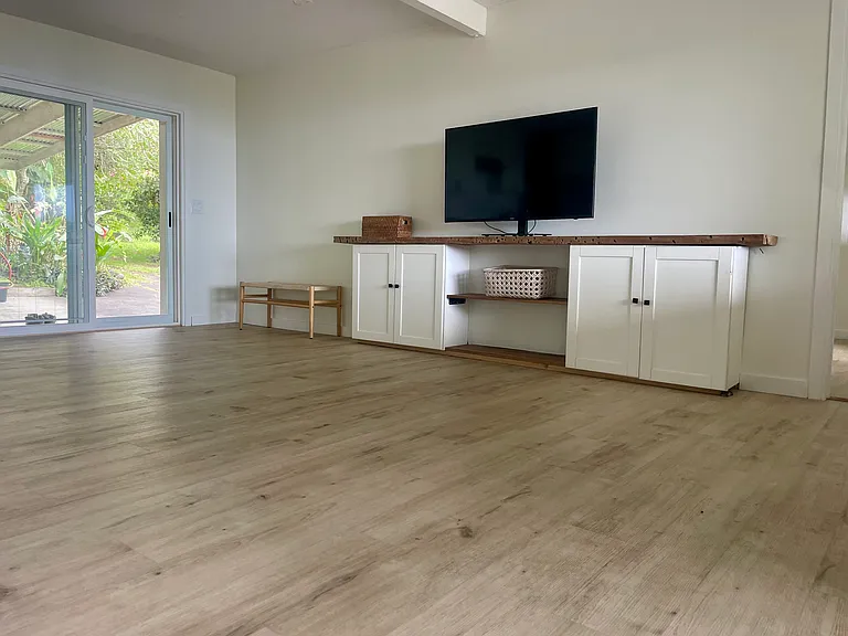 Living Room and sliding door out to carport/ yard