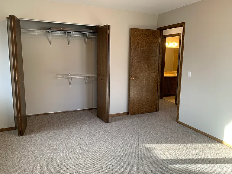 East bedroom, open closet
