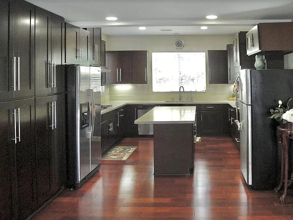 Kitchen: Extensive pantry space, spacious island, dishwasher and space for two refrigerators