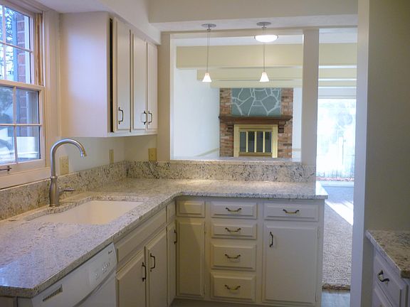 Beautiful kitchen with new appliances and walk-in pantry