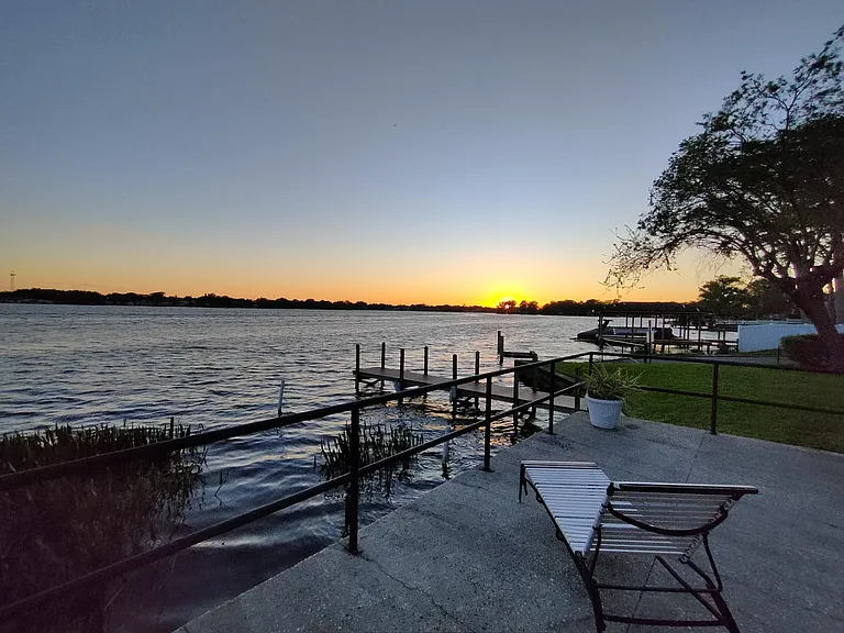 Lakeside patio, community dock, and boat ramp. In July you can see the distant Orlando fireworks.
