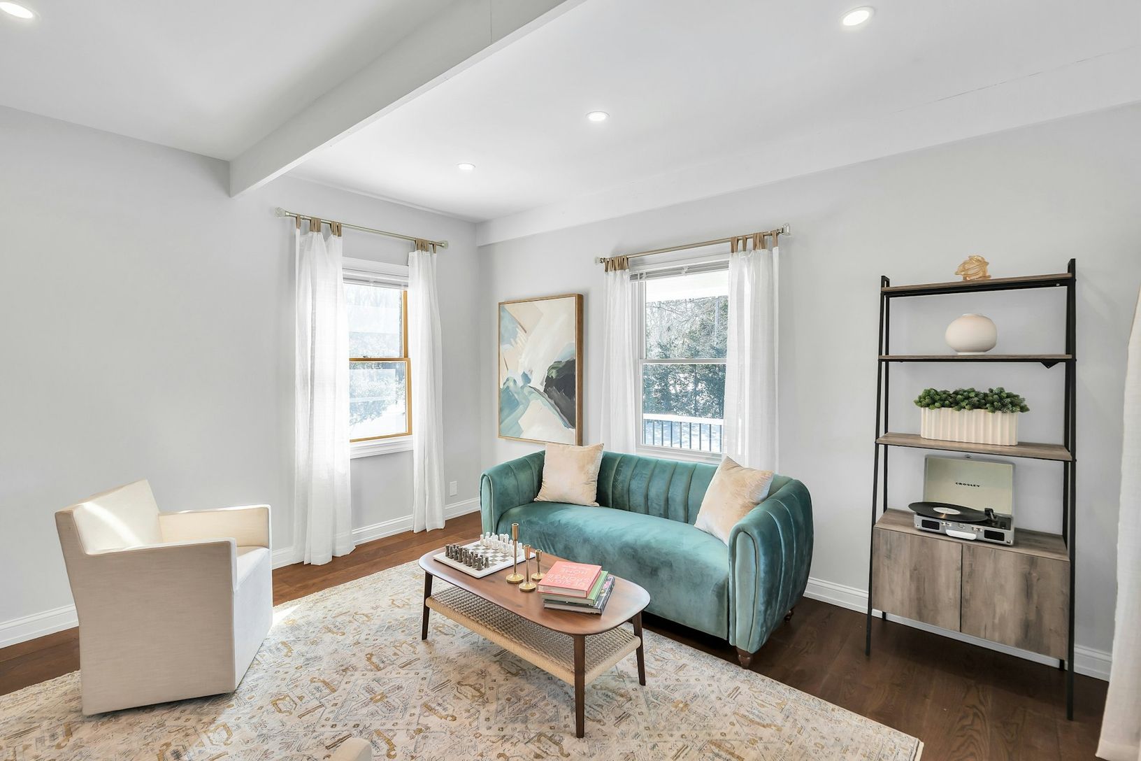  Full of light with new Andersen windows and original trim details.