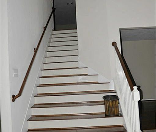 Stair Case With Wood Steps.