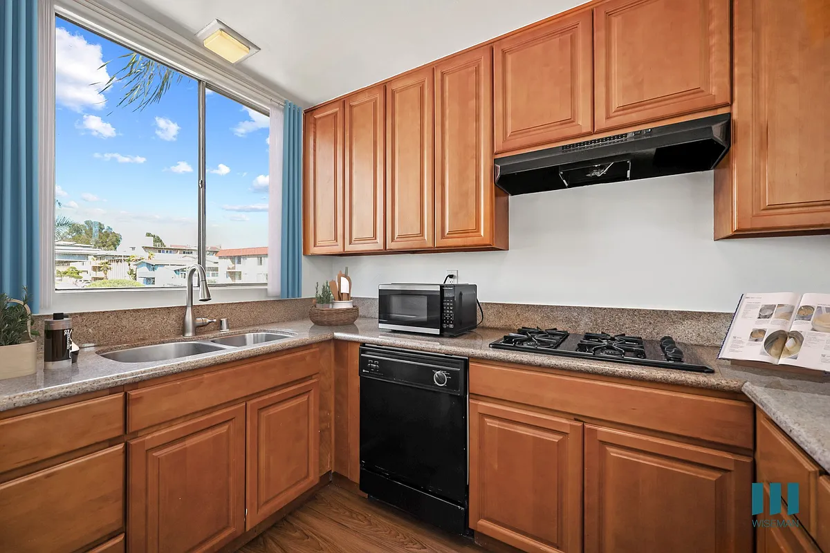 Kitchen with Gas Range, Dishwasher, and Microwave - Gorham Ten by Wiseman
