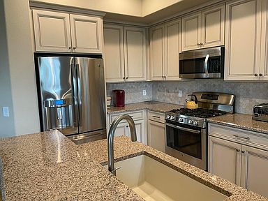 kitchen with quality appliances, including low noise dishwasher