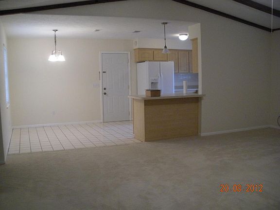 from living room to dining and kitchen