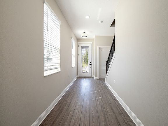 This home by LGI Homes has a beautiful long entryway
