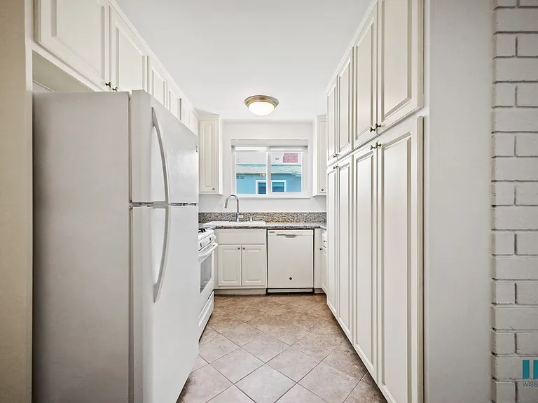 Kitchen with Refrigerator, Stove, Dishwasher, and Ample Cabinet Storage