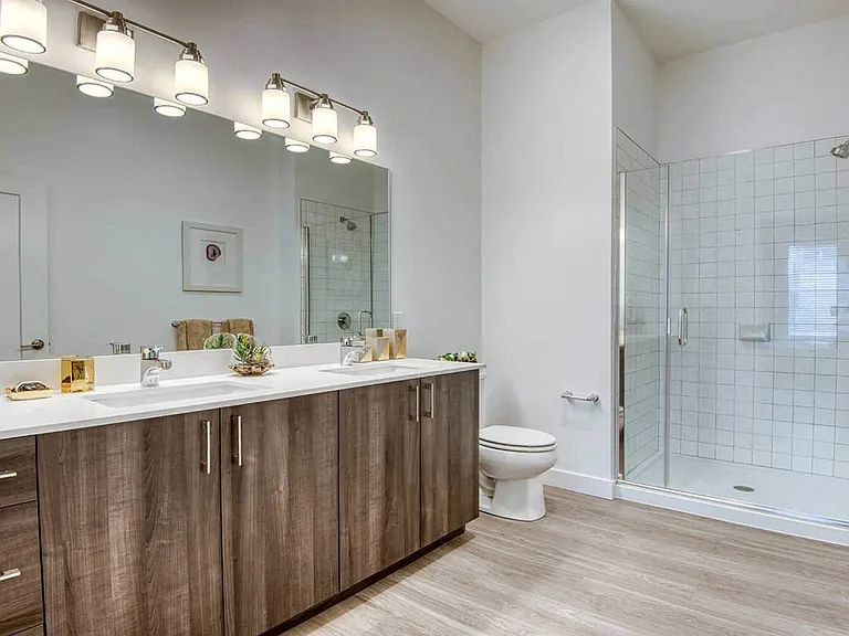 Frameless glass stand-up showers in select apartment homes