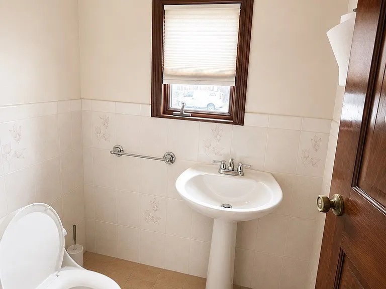 Half bath on first floor. 2nd half bath is in basement.