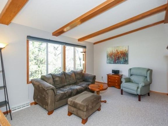 The living room show off newer trim, the entire home has newer windows, Shingles are about 4 years old with hail damage repair about 1 year ago.