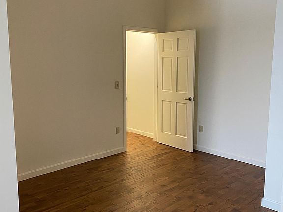 Second view of Bedroom #1 with walk in closet.