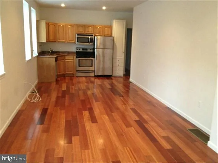 open, spacious sunlit Kitchen, Living and Dining space