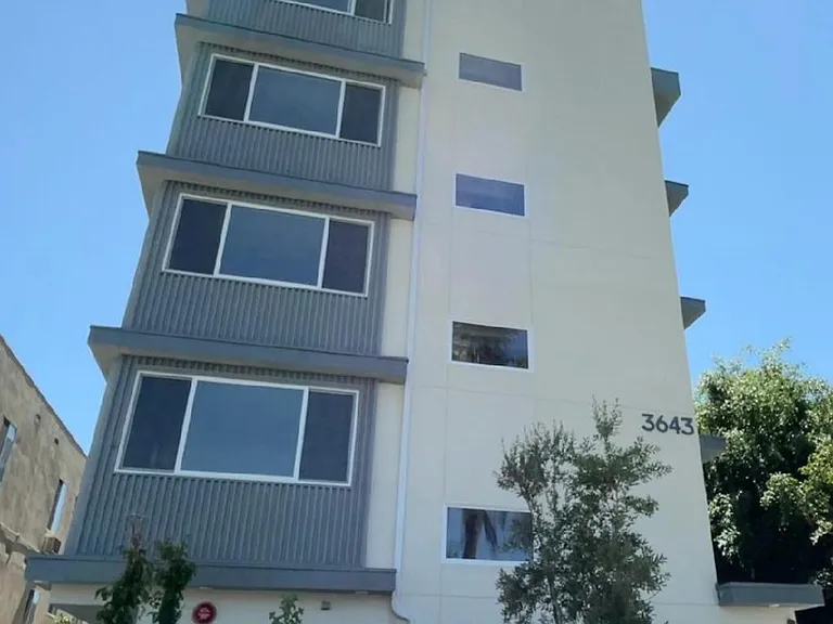 Building front view from the sidewalk