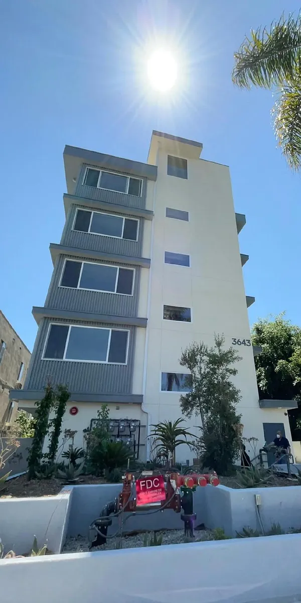 Building front view from the sidewalk - 3643 Empire Dr #101