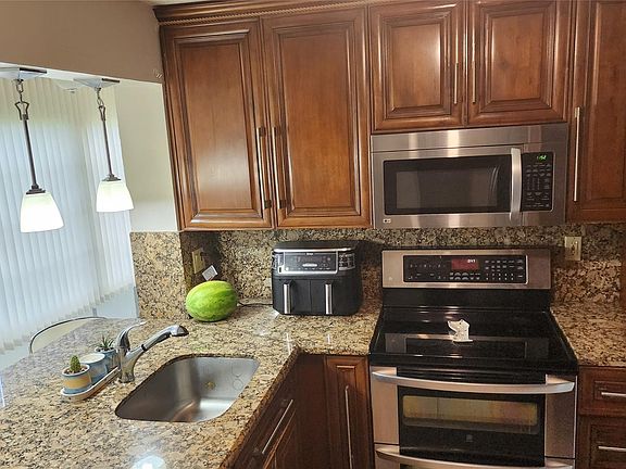 4th image of 9100 Lime Bay Boulevard #107